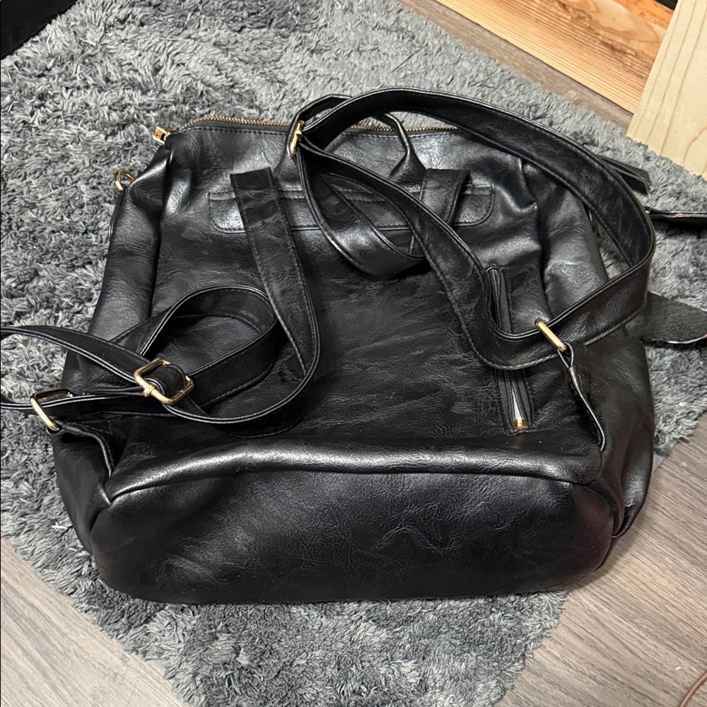 Black Leather Backpack With Patterned Strap - image 2